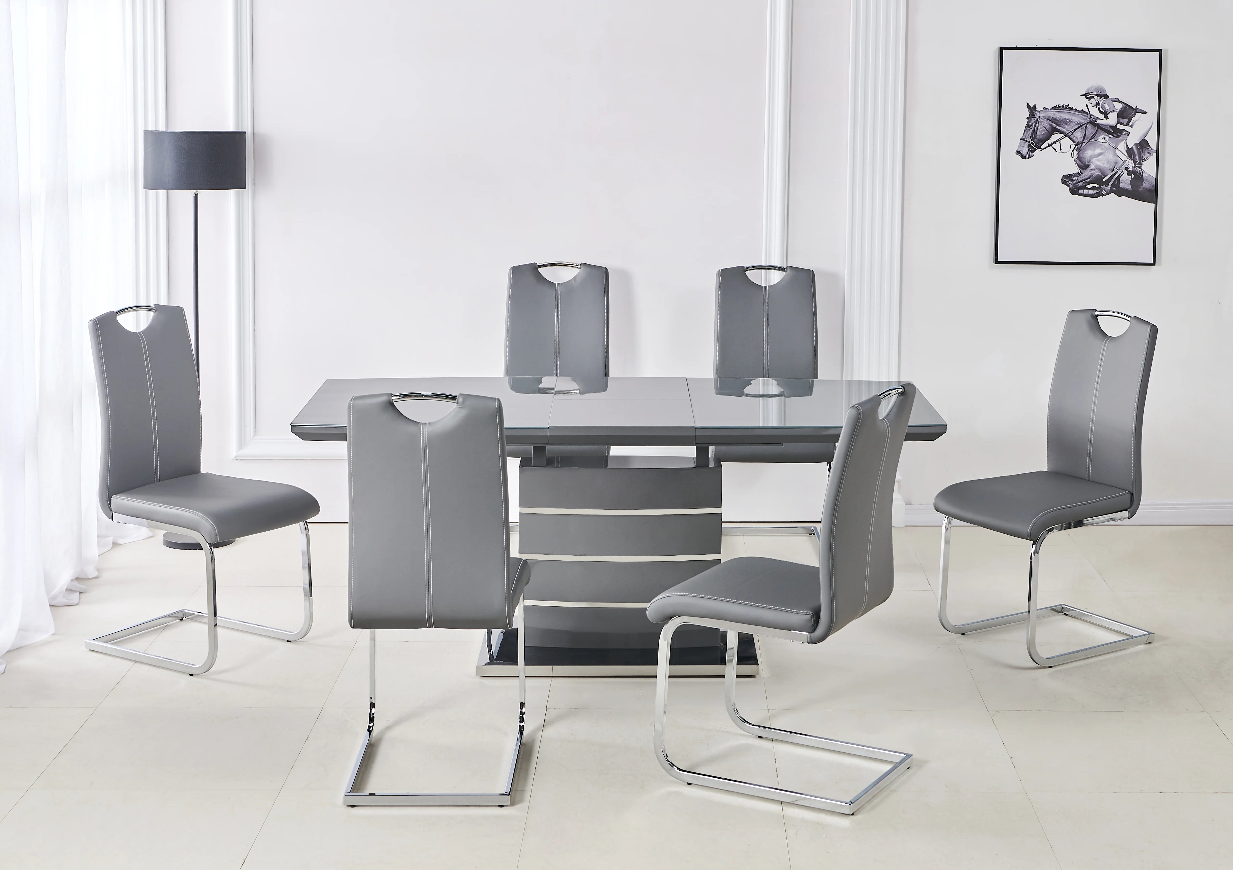 Grey Milan dining chair with soft PU upholstery and stylish chrome legs