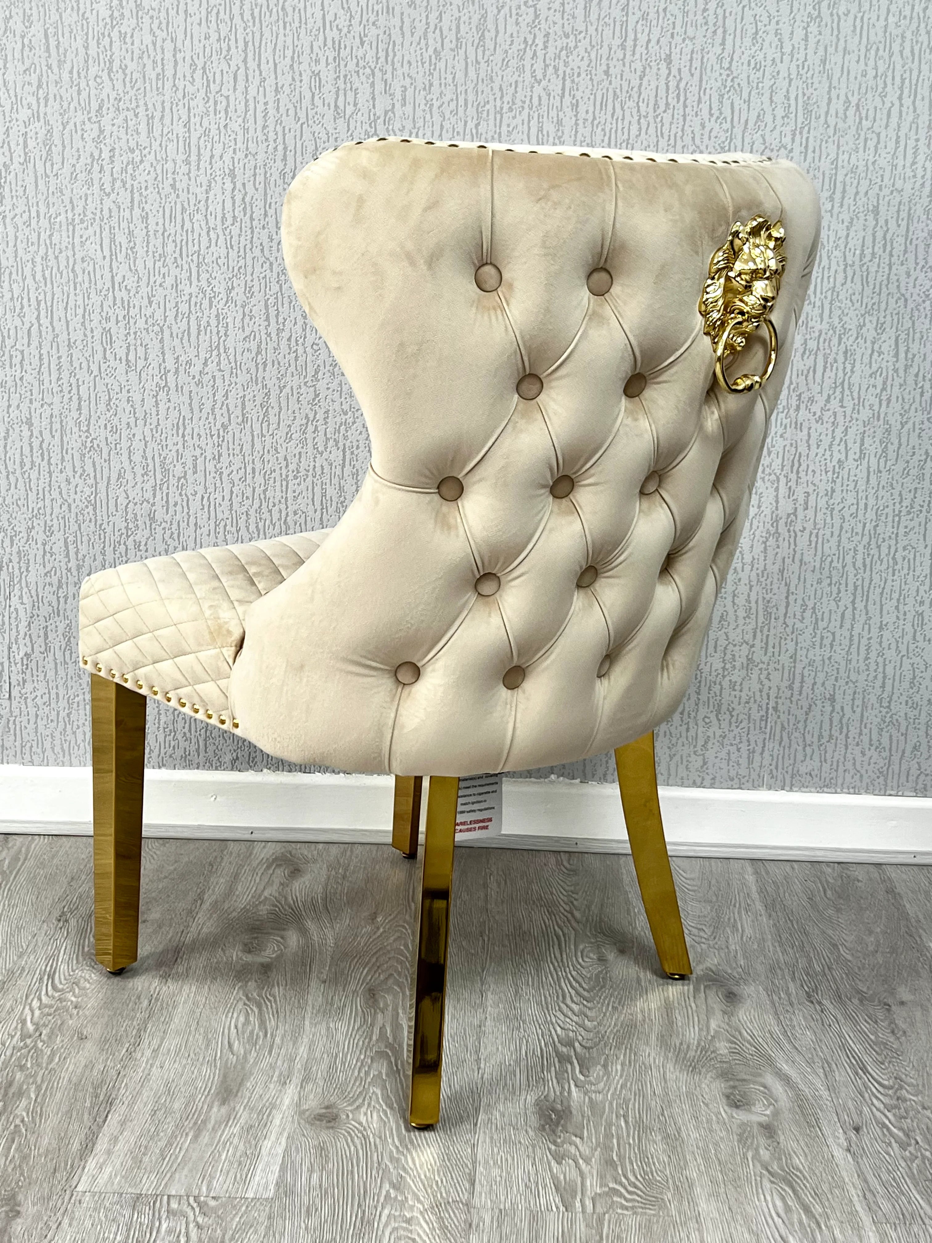 Contemporary luxury marble dining table with Valentino gold chairs for stylish lifestyle homes in Newcastle, Nottingham and Sheffield UK