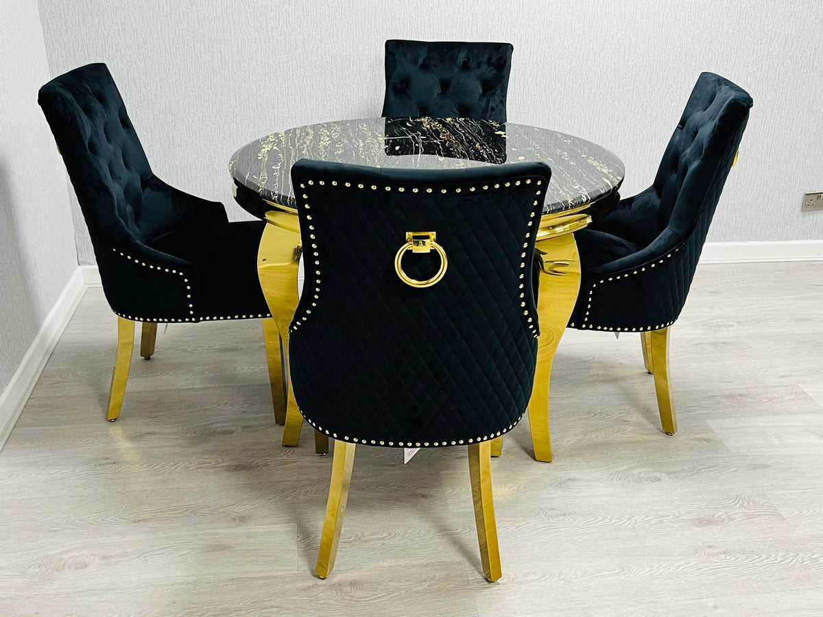 Majestic black gold lion knocker dining chairs paired with marble table creating a luxury statement interior in Oxford, Cambridge and Bath UK homes