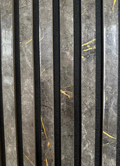 Close-up of marble black and gold wall panel