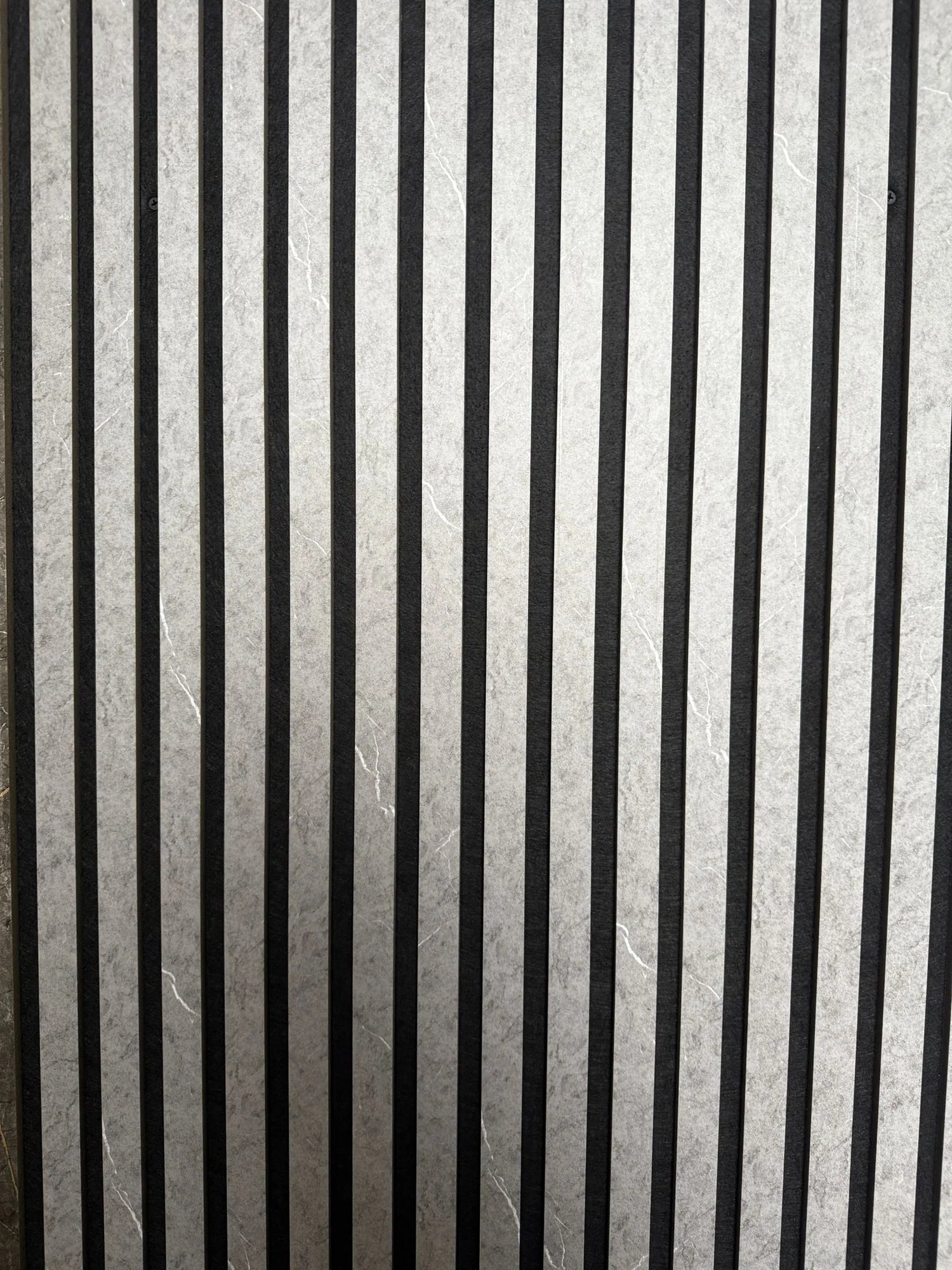 Marble grey slatted wall panel in contemporary interior