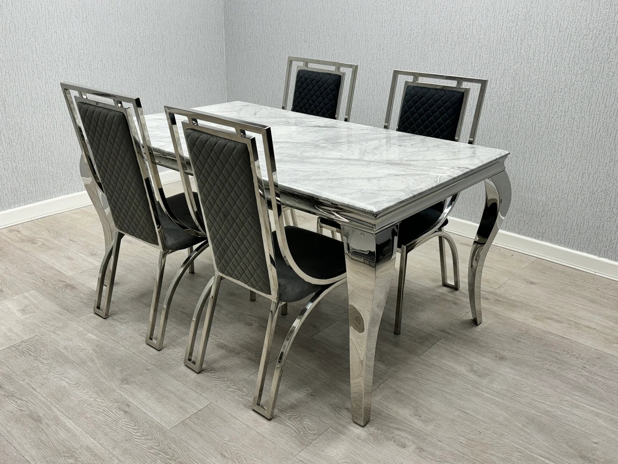 High-end marble dining furniture with Windsor chairs for Newcastle homes, perfect for family meals and dinner parties.