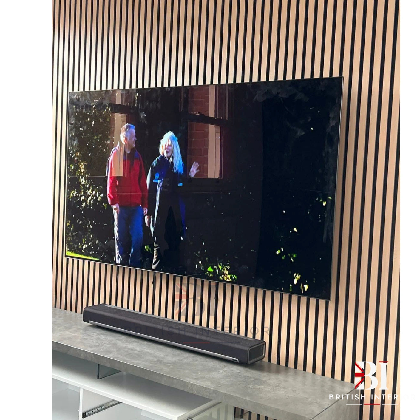 Natural Oak acoustic slatted wall in a living room