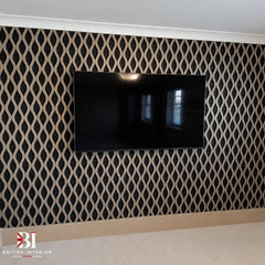 Natural oak waved wall panel behind a television