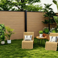 Oak composite fence panels installed in a landscaped garden