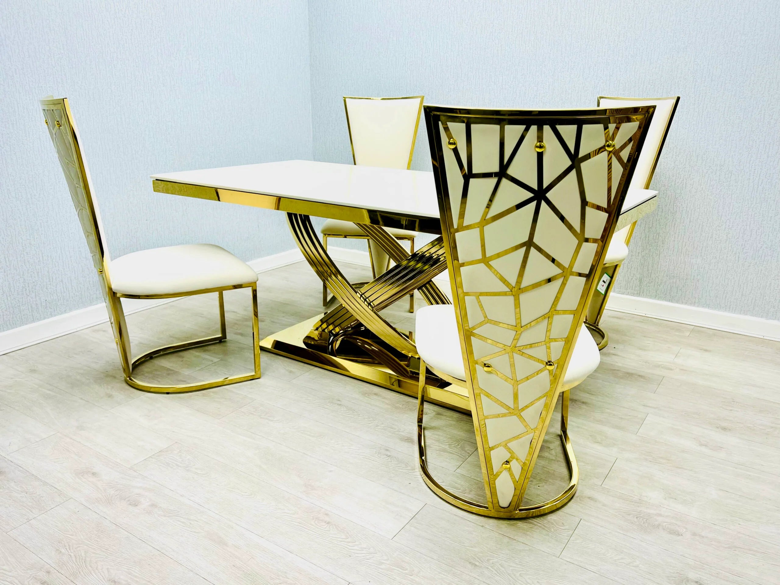 Premium 6–8 seater Elina dining set with high-gloss marble tabletop and gold finish, designed for elegant Edinburgh homes and stylish entertaining.
