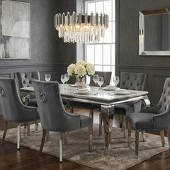 Modern marble dining furniture with plush upholstered seating for Glasgow luxury interiors and sophisticated home renovations.