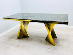 Black and gold dining table and chairs for modern UK dining room