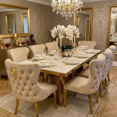 Premium Ravello cream and gold dining furniture for London homes, featuring a sculptural gold pedestal and coordinated Valentino Chairs for stylish family dining.