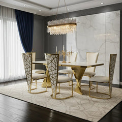 Cream marble dining table with polished gold pedestal and Vienna seating for sophisticated London apartments