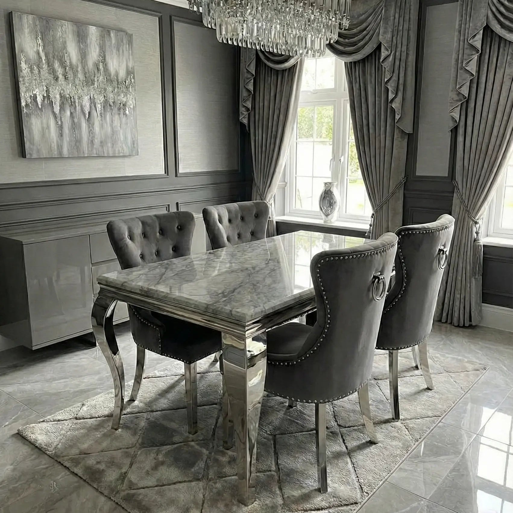 Modern rectangular grey marble dining table with premium upholstered seating.