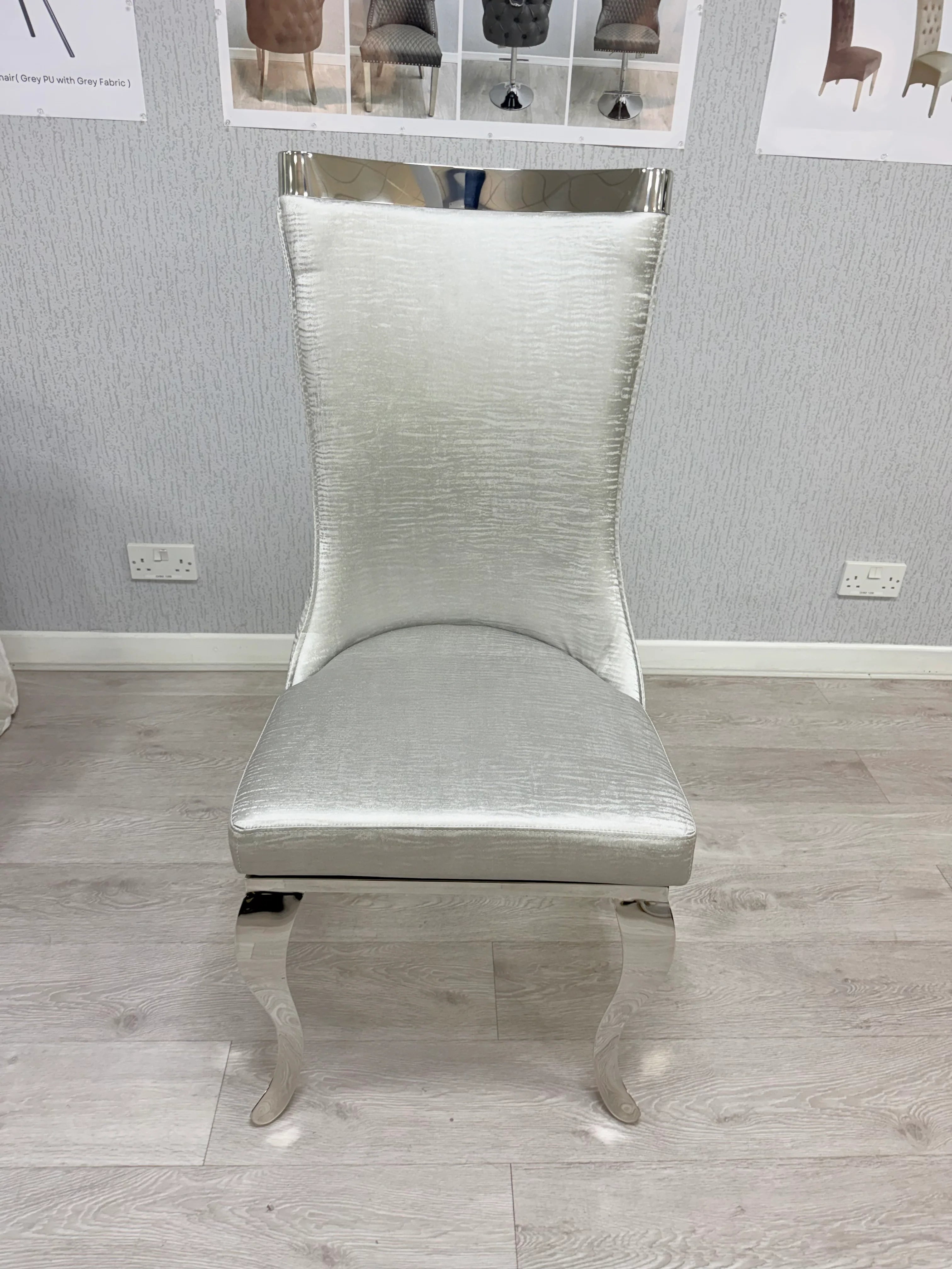 Close-up detail of the Rocky dining chair design with premium fabric finish silver and grey