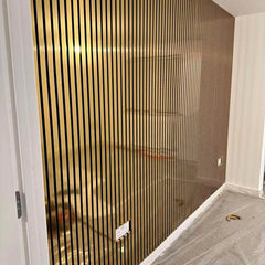 Shiny gold acoustic panels used as a contemporary feature wall