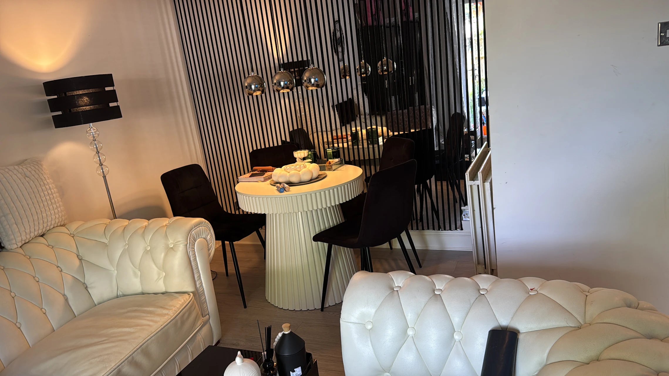 Shiny Silver acoustic slatted wall panels used on a feature wall