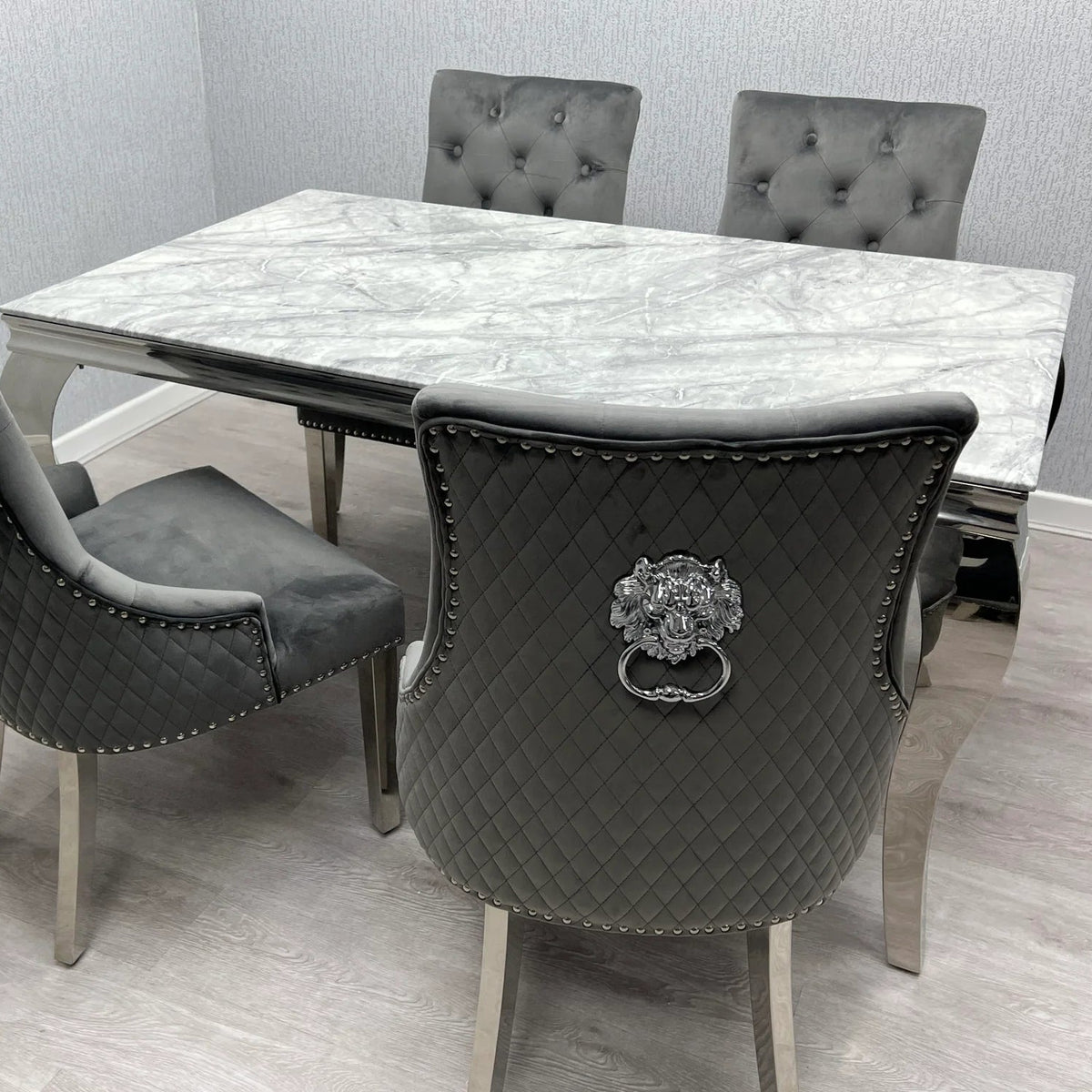 Sofia 150cm Grey Marble Dining Table with Majestic Grey Lion Knocker Chairs creating a luxury dining focal point for London apartments, modern homes, and stylish entertaining.