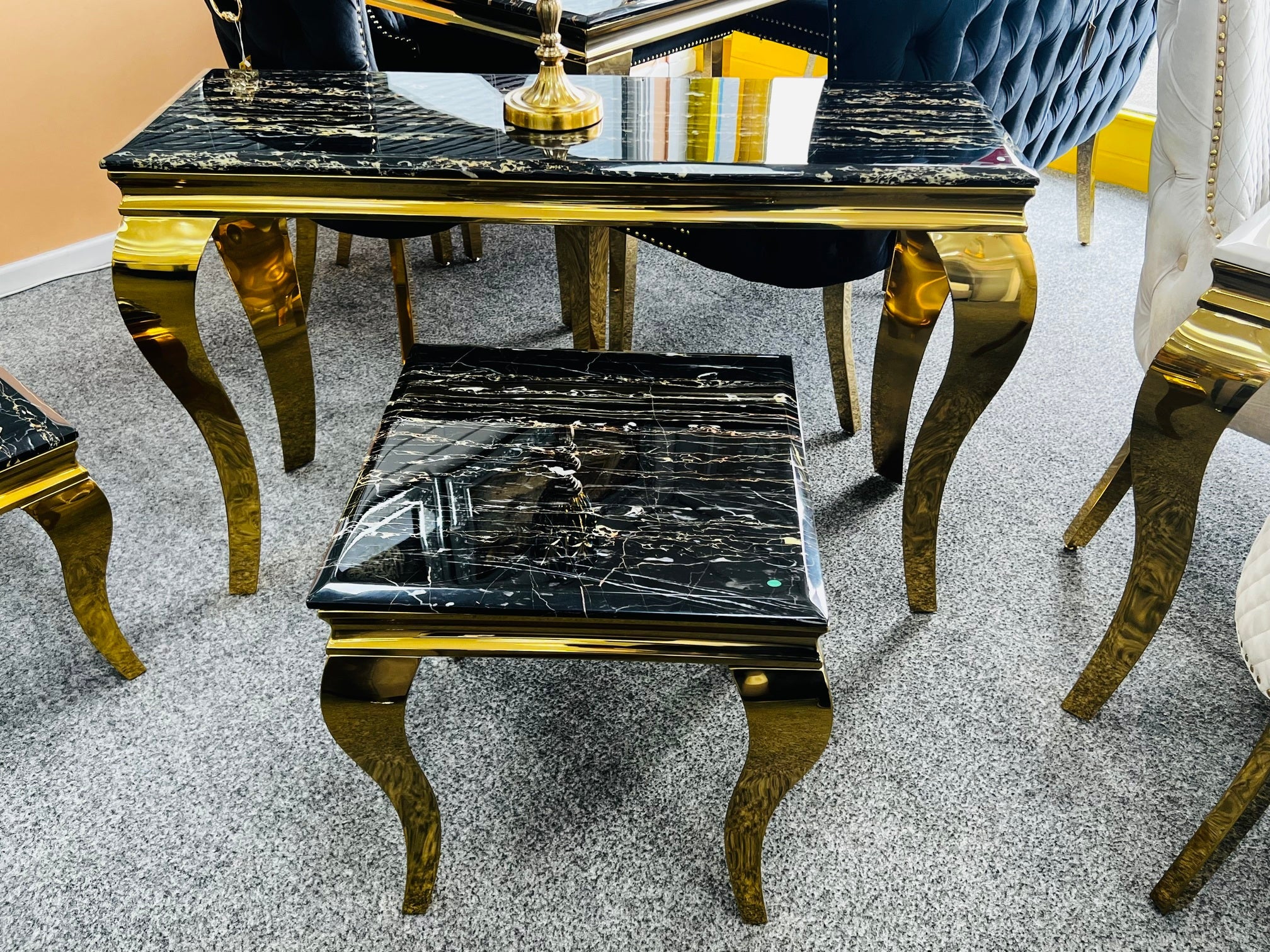 Black gold marble dining set with designer lion knocker chairs for open plan kitchens and luxury dining areas in Bristol, Reading and Milton Keynes UK