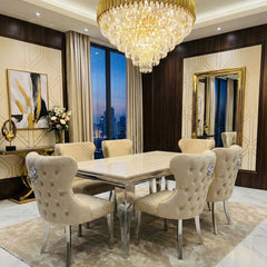 British Interior Sofia Cream Marble Dining Table with Valentino Lion Knocker Chairs creating a luxury dining room centrepiece for London penthouses, perfect for elegant dinner parties and refined family dining.