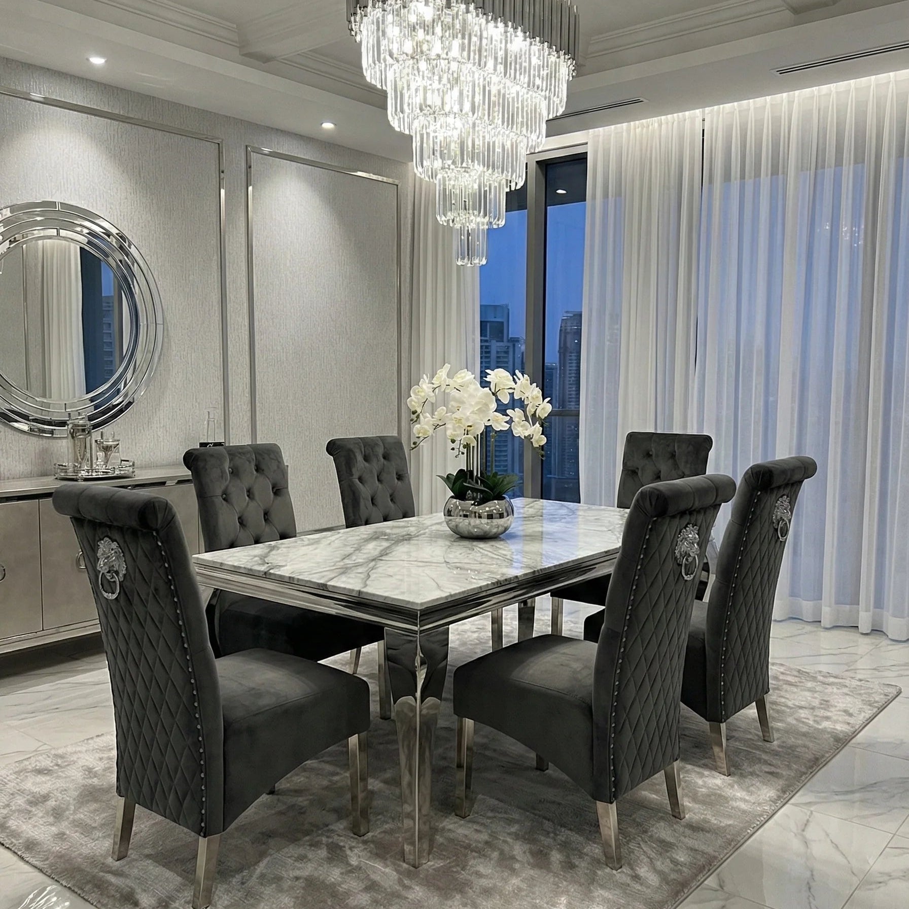 Sofia grey marble dining table with lion knocker chairs for luxury UK dining room