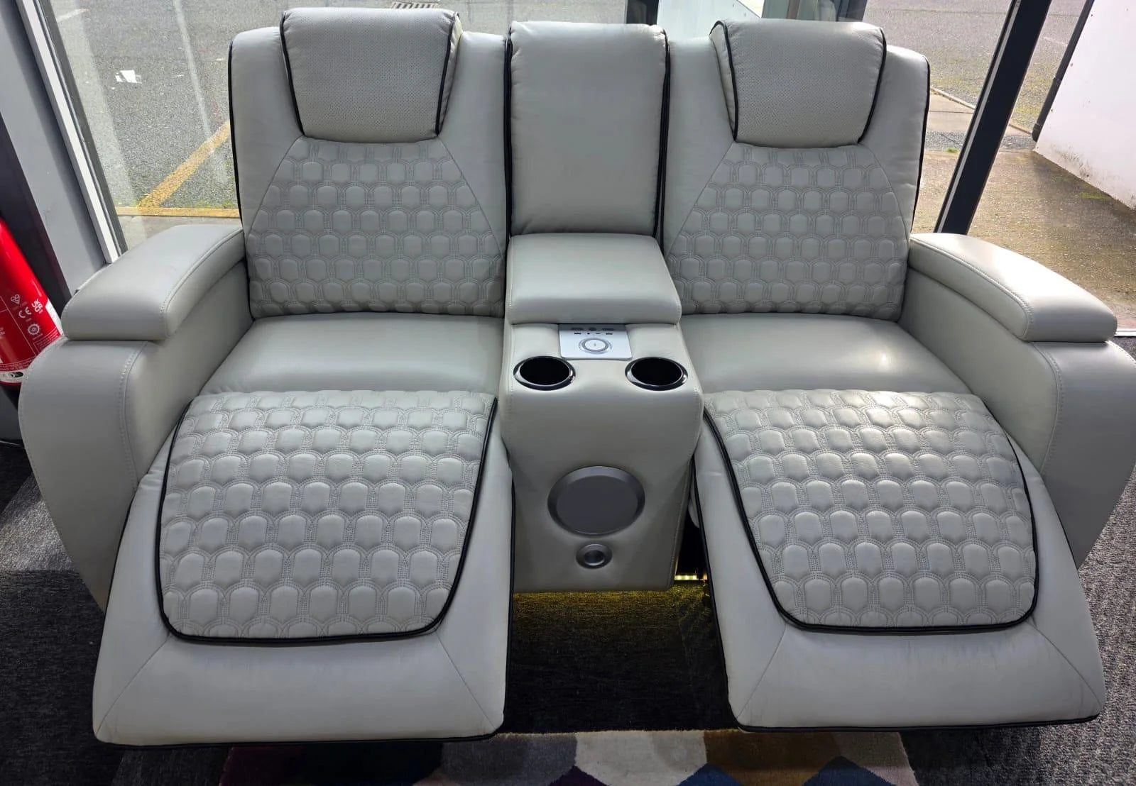 Sofia leather recliner sofa with integrated cup holders