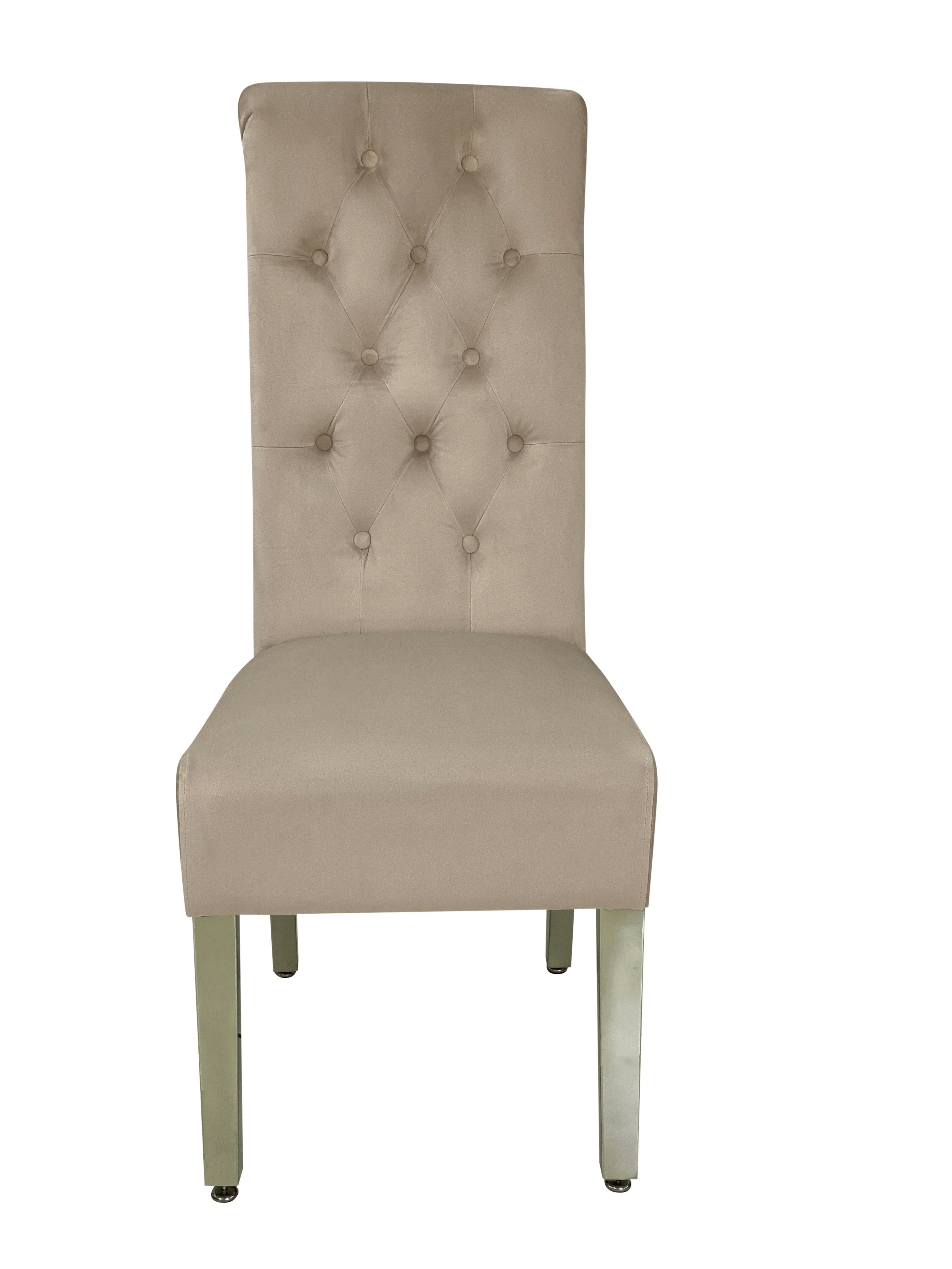 Sofia Mink dining chairs with a polished grey marble table creating a warm and refined luxury dining space