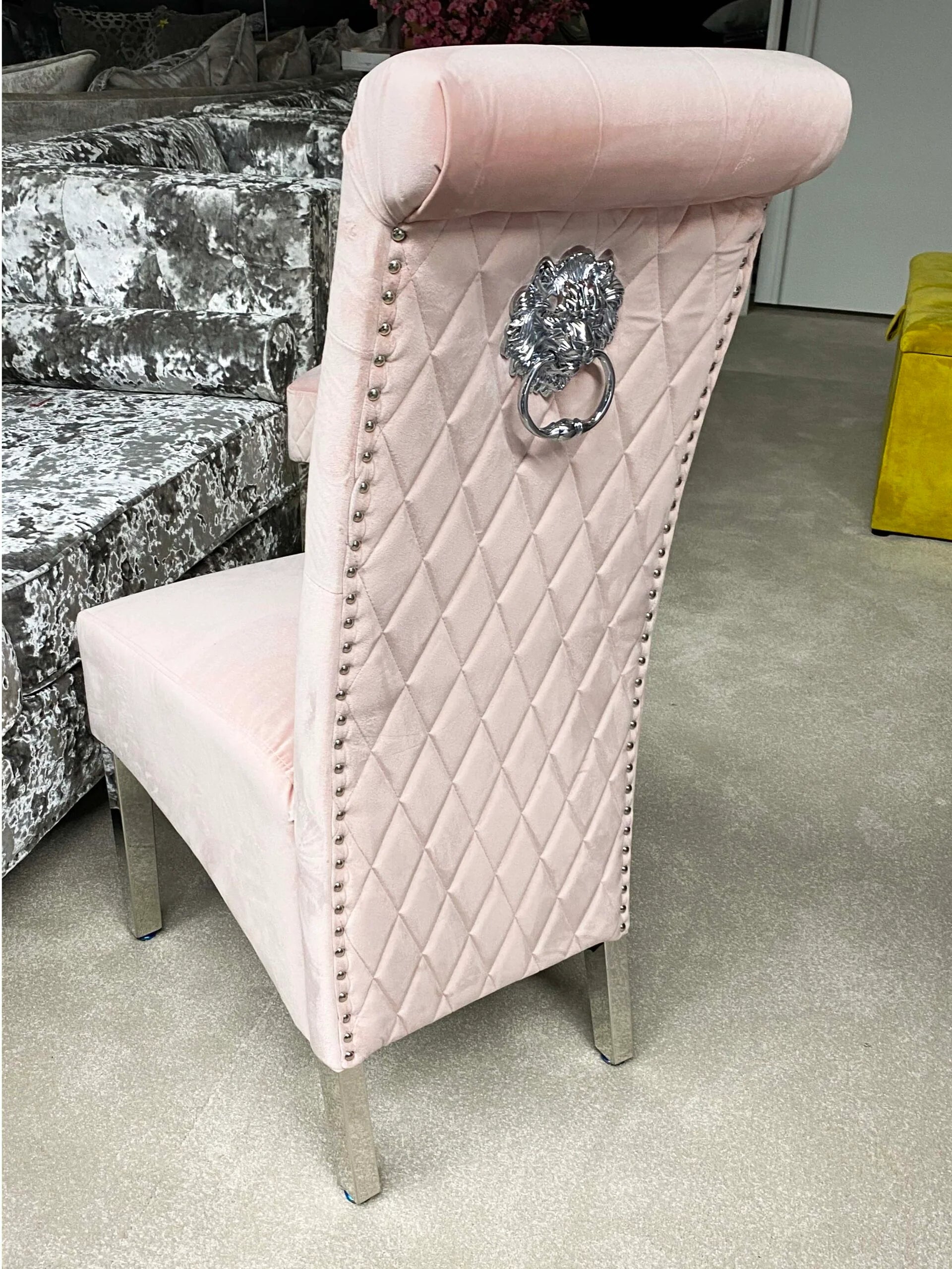 Sofia Pink upholstered dining chairs paired with a grey marble dining table for a soft contemporary dining look