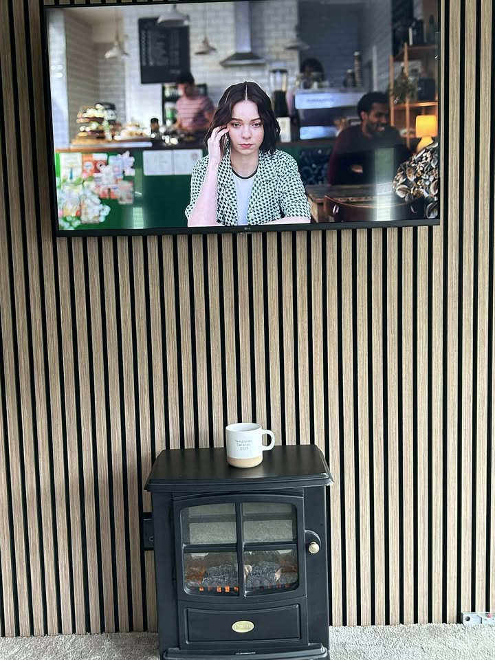 Walnut acoustic feature wall panel from customer