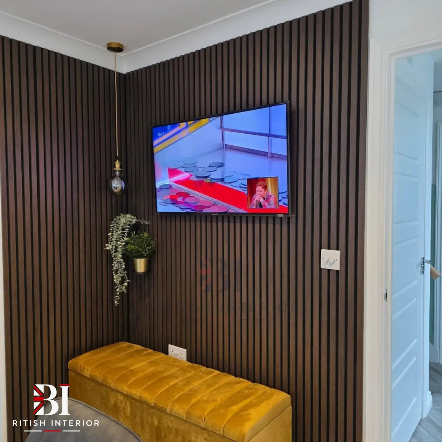 Walnut acoustic slat wall panel positioned for wall installation