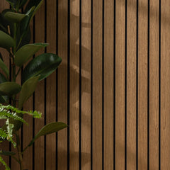 Close-up detail of Walnut wide slat acoustic wall panel