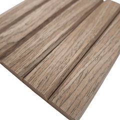 Close-up of flexible walnut slat wall panel with real wood veneer